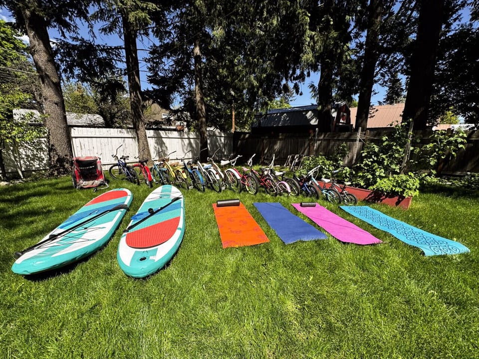 Adult and kids bikes along with bike trailer. 2 paddle boards and 4 yoga mats to make your summer retreat.