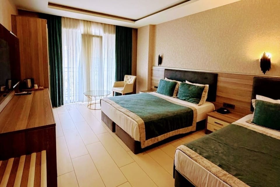 Standard Triple Room, 1 Bedroom | In-room safe, individually furnished, laptop workspace, free WiFi