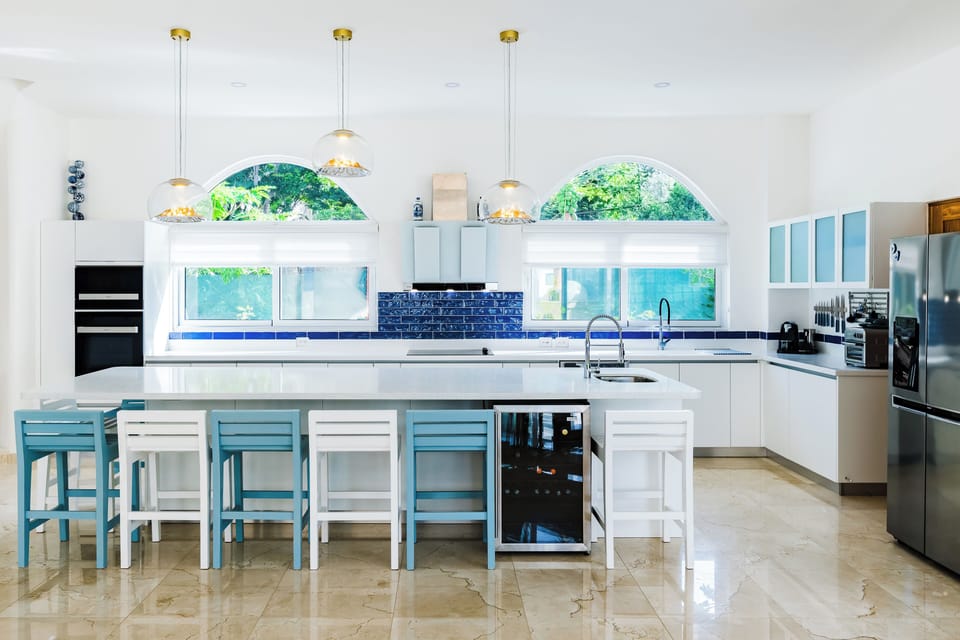 Experience the future of cooking with our sleek, modern kitchen and state-of-the-art appliances.