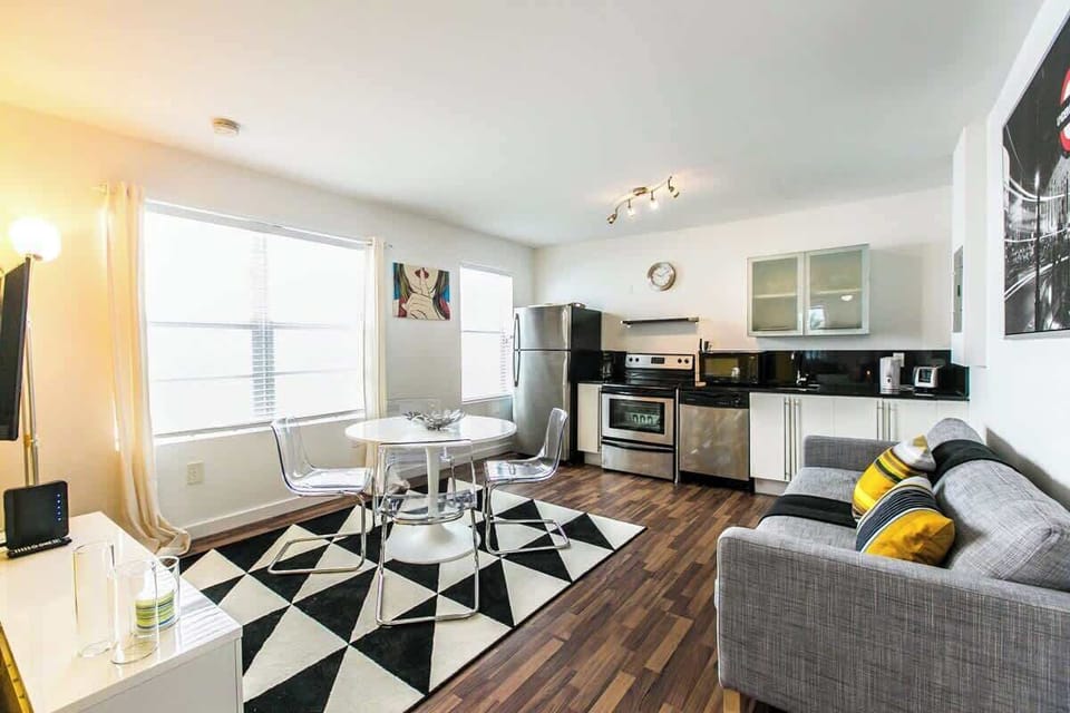 this modern space blends bold colors, city-inspired art, and minimalist design.
