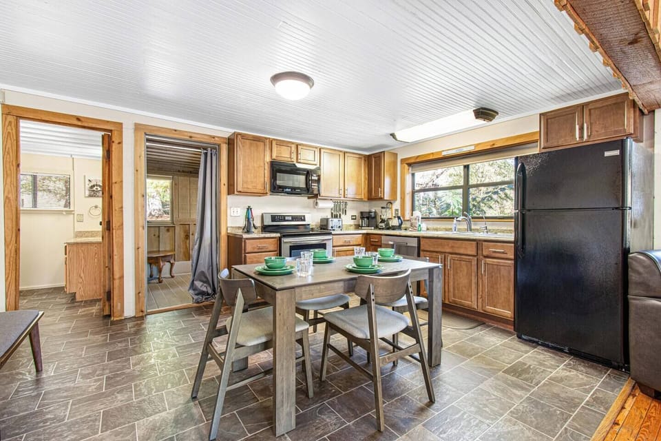 Fully stocked kitchen and dining area