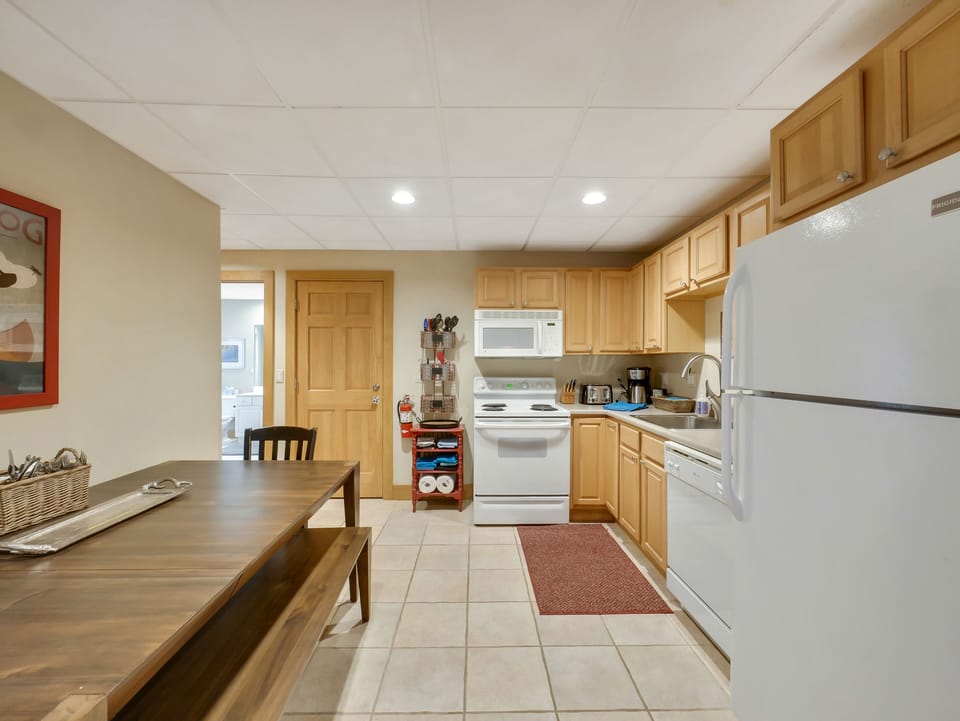 2nd full kitchen and eating space for families.