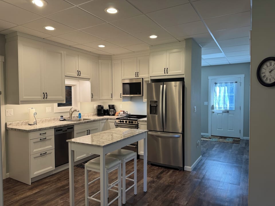 Kitchen, looking toward front entry.