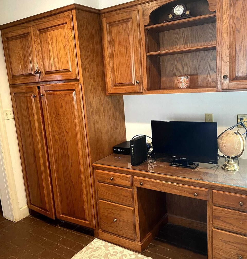 Opposite the breakfast table is the workstation.