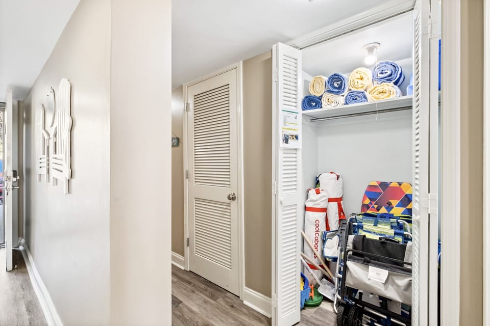 Beach towels, cooler, beach chairs, Cool Cabanas and wagon to haul it all.