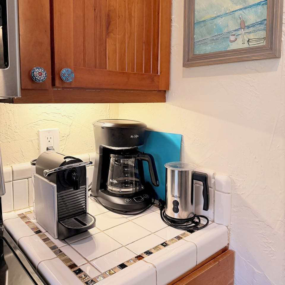 Coffee!! There's a Nespresso machine, a Mr Coffee filter machine & milk frother.