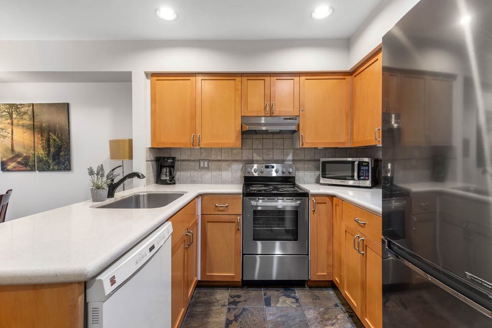 Whip up delicious meals in the fully stocked, modern kitchen.
