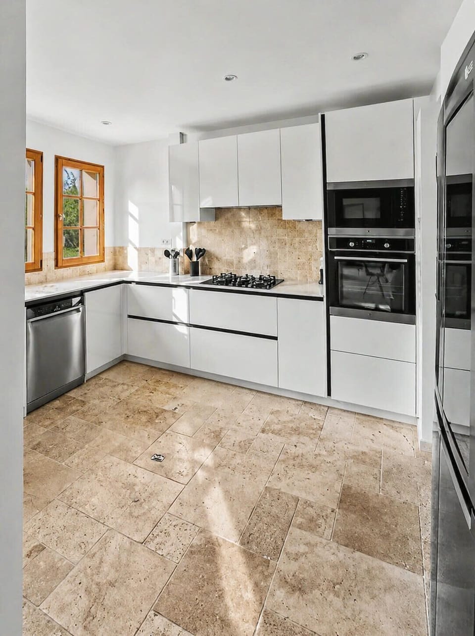 Modern, bright kitchen, perfect for friendly meal preparations.