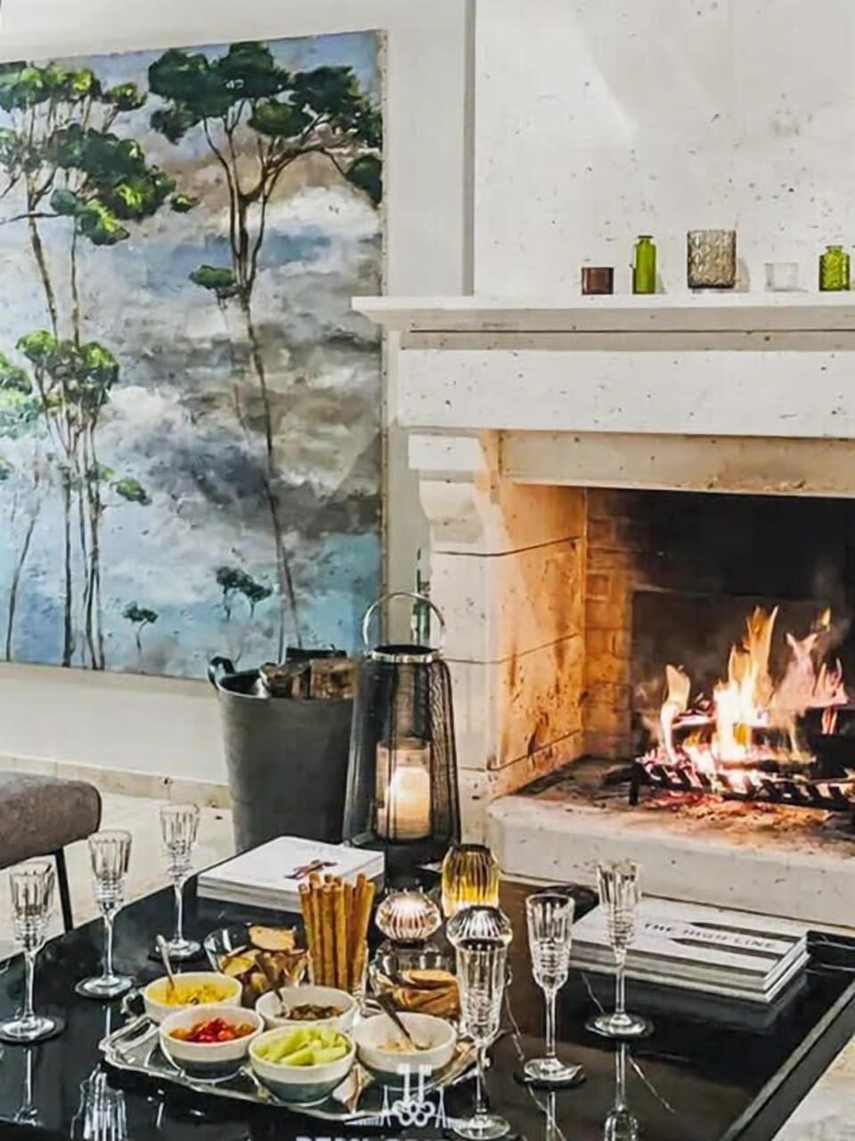 Cozy living room with fireplace for warm evenings.