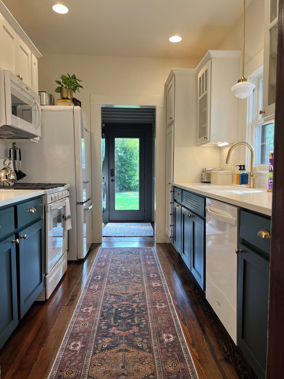 Step out the back door to a deck with a gas grill, games, and plenty of seating