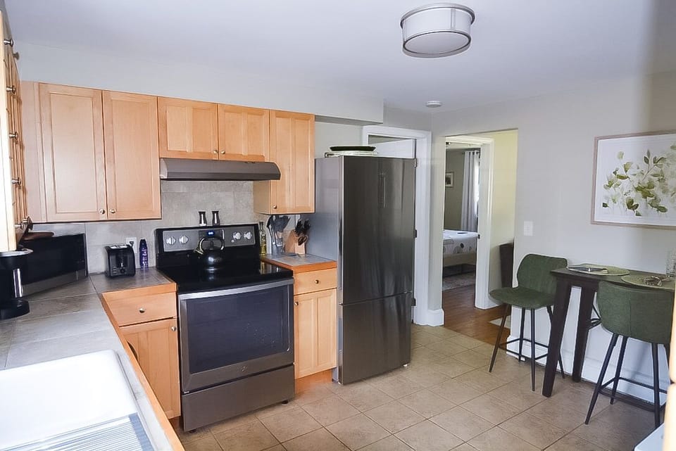 toaster, knife block, cooking utensils
