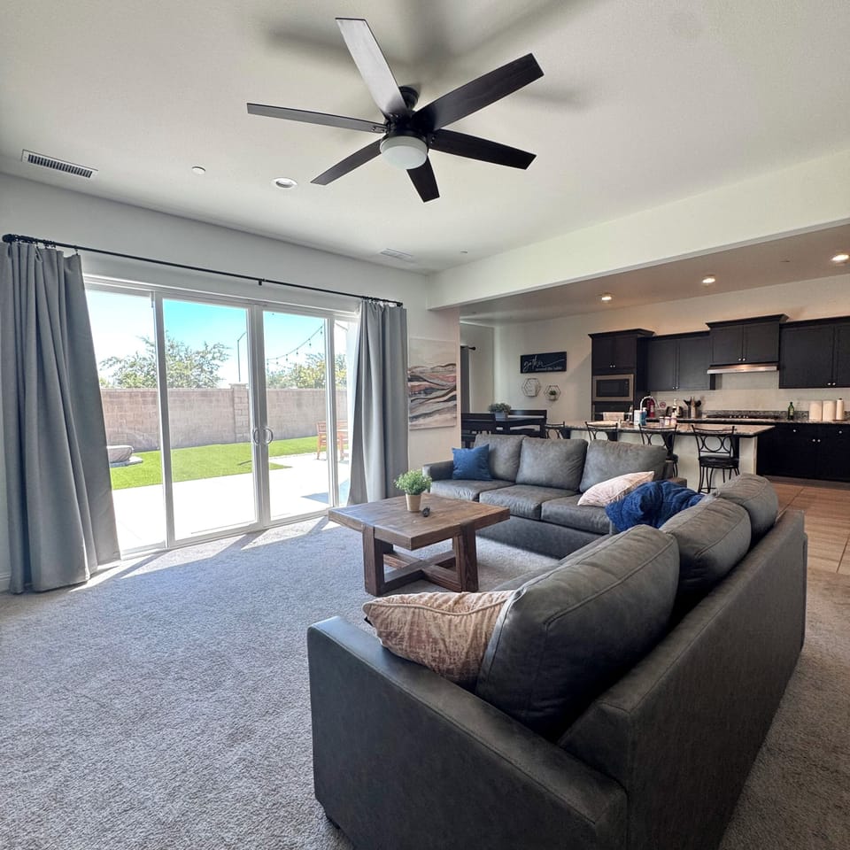 Modern living with open space, stylish comfort, and outdoor access for all. 