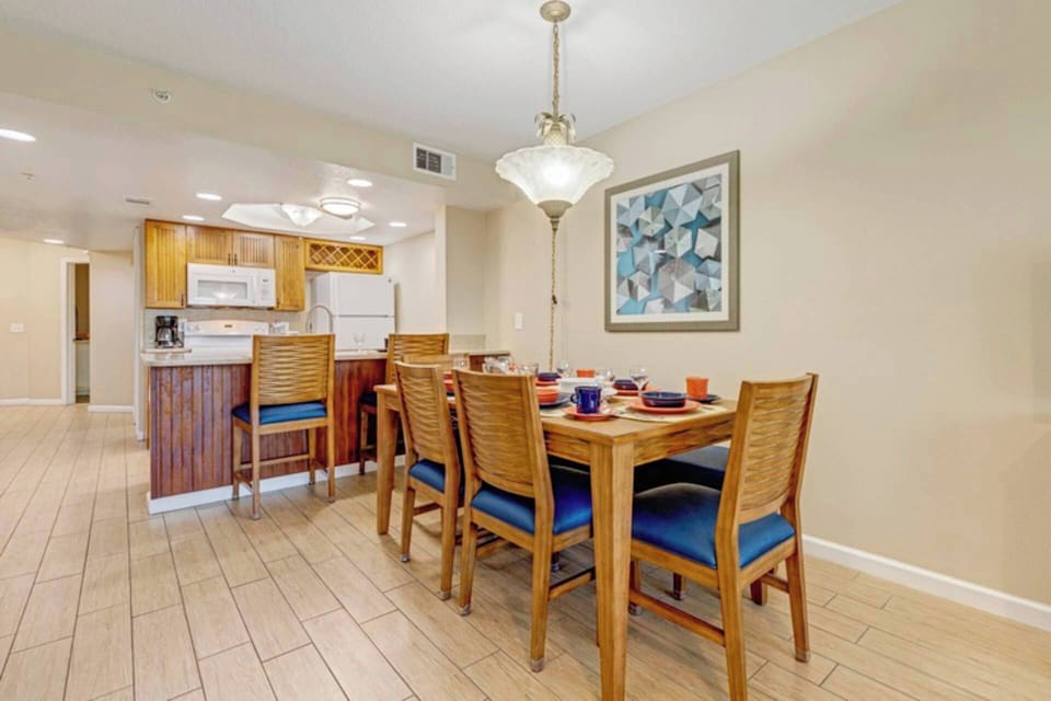 Separate dining area with extra seating at the breakfast bar.