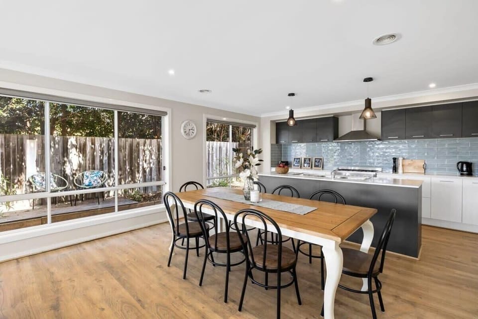 Overlooking the dining and living area, the kitchen allows for easy meal prep while staying connected with the family