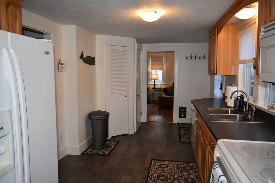 In the kitchen, looking back towards the living room.