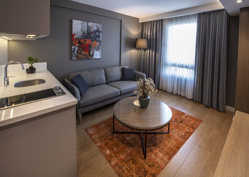 Junior Suite, 1 King Bed, Non Smoking, City View | 1 bedroom, premium bedding, minibar, in-room safe