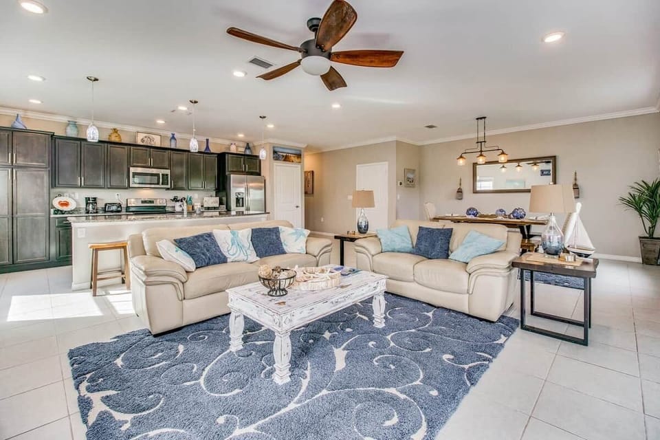 Family time abounds with our fully open main floor space. Double patio doors fully open to wonderful Florida sea air.