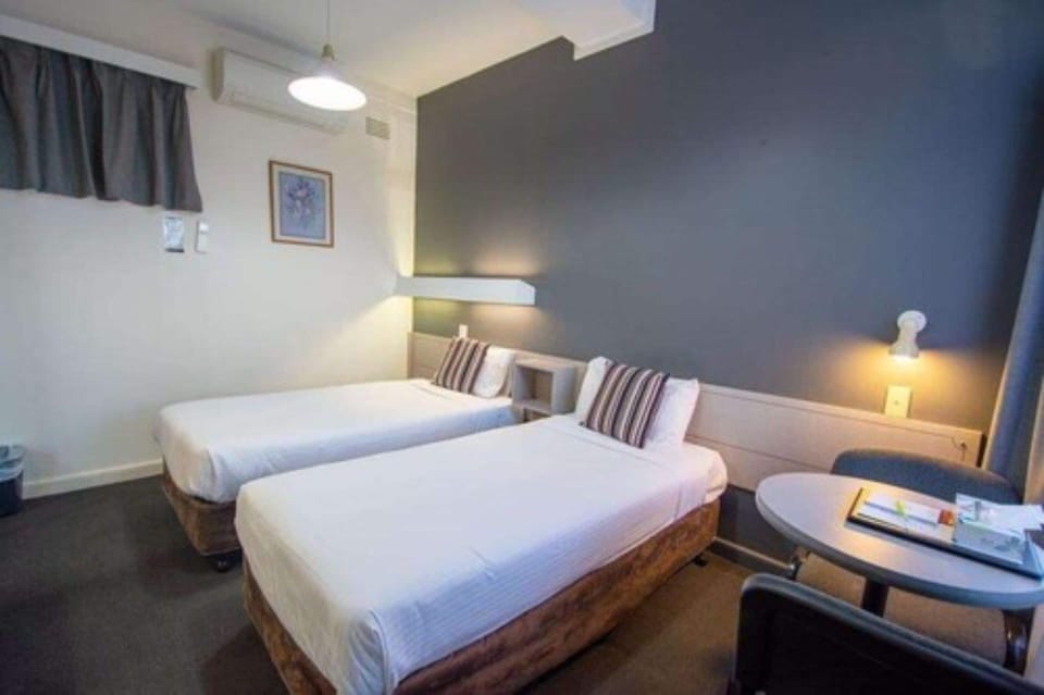 Budget Twin Room | Blackout drapes, iron/ironing board, free WiFi, bed sheets