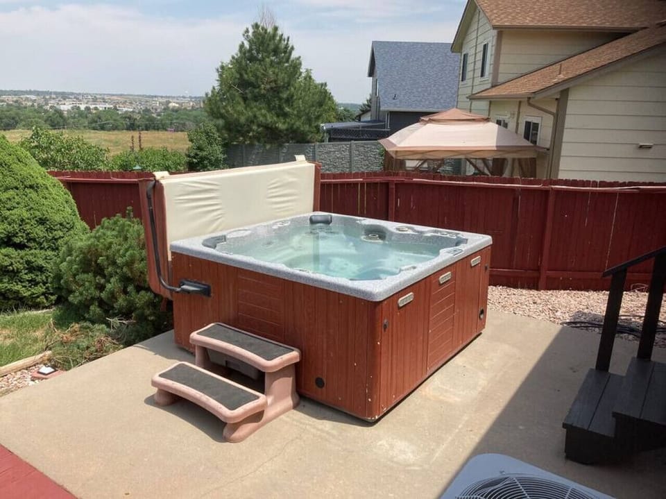 The 6-person hot tub in the backyard only a few stairstep from the main Bedroom.