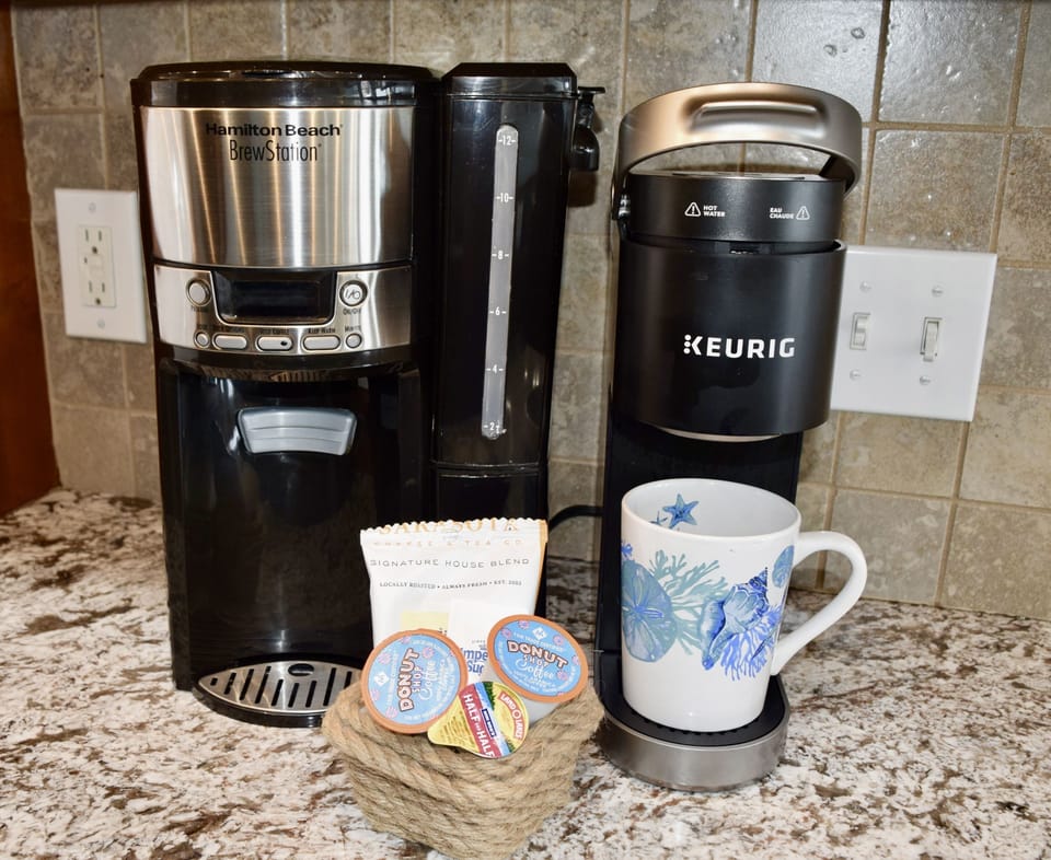 Coffee maker and Keurig machine. 