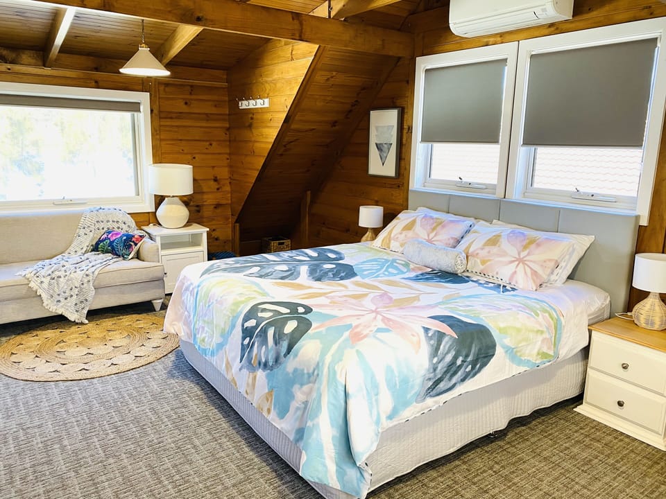 Master bedroom with king bed and day lounge