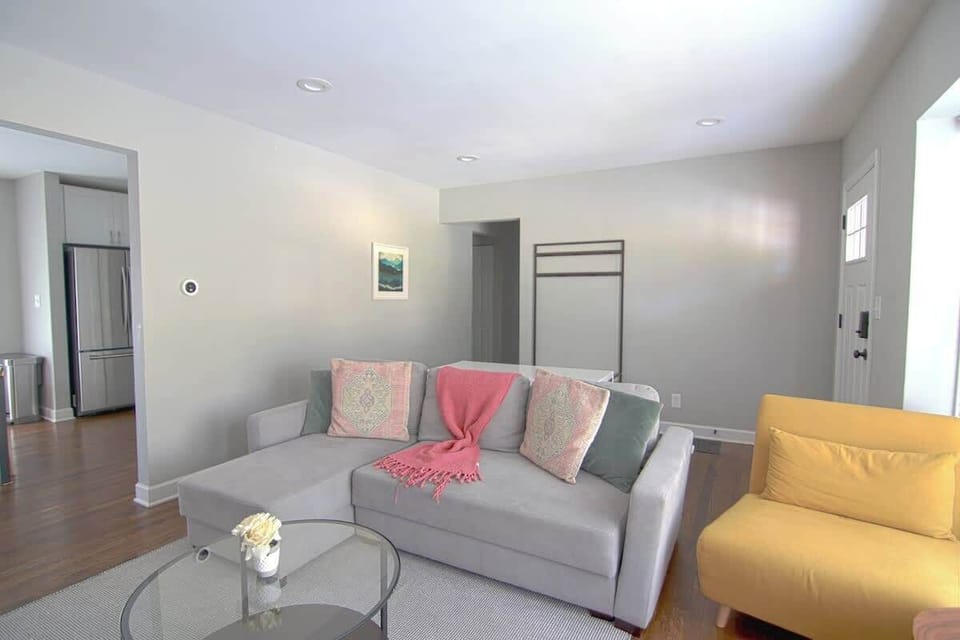 Relax by the fireplace and watch your favorite television shows in the living room