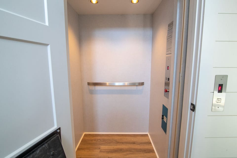 Elevator at Sunset Serenade, blending luxury and practicality in this award-winning vacation home.