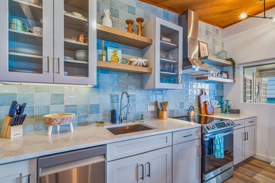 Prepare meals in the fully stocked kitchen and dine with ocean views