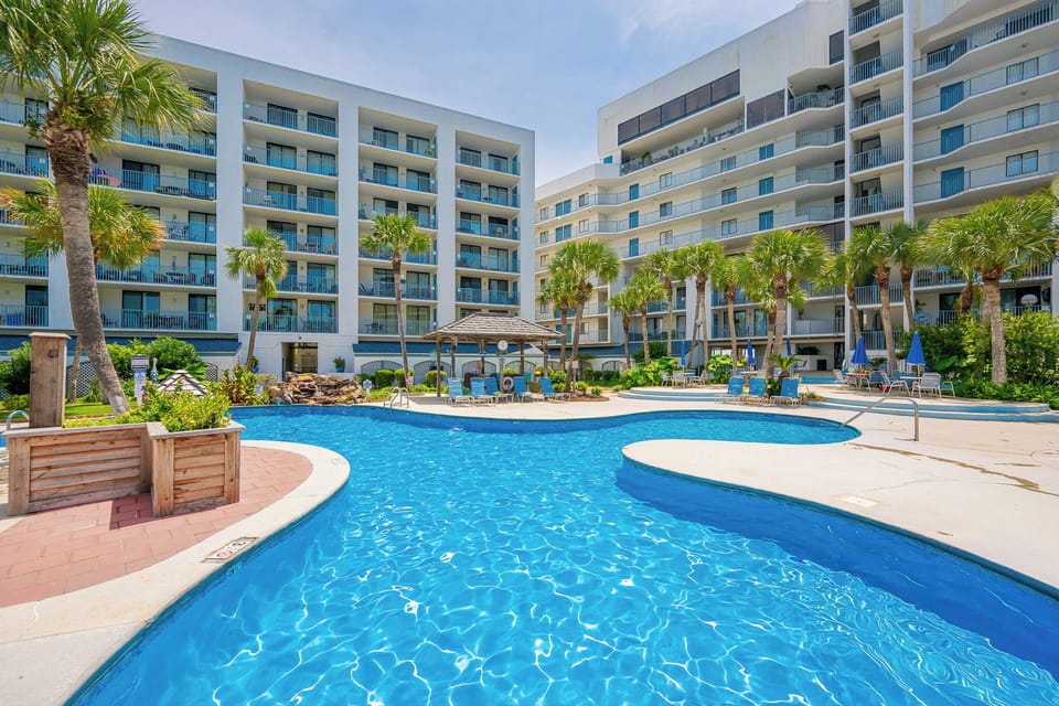 Relaxing by the pool is a must while here on vacation