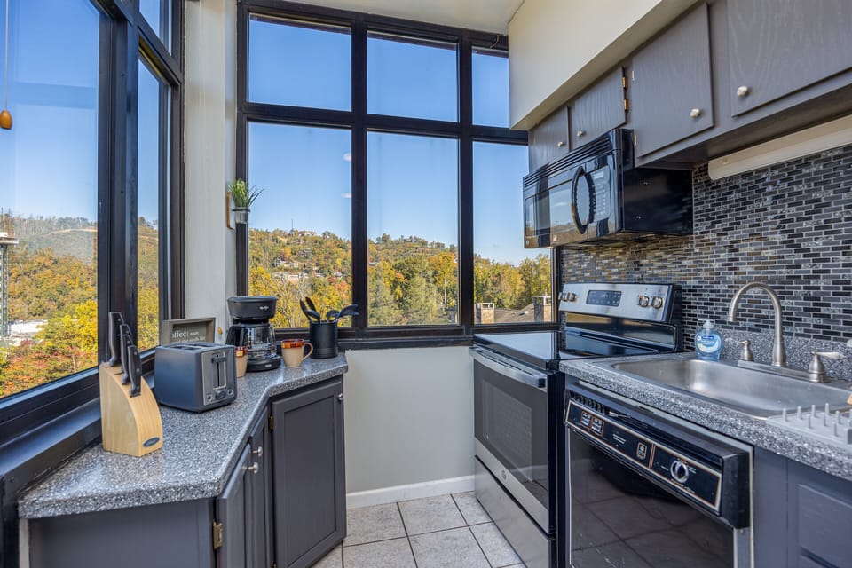 Fully stocked kitchen with a view"