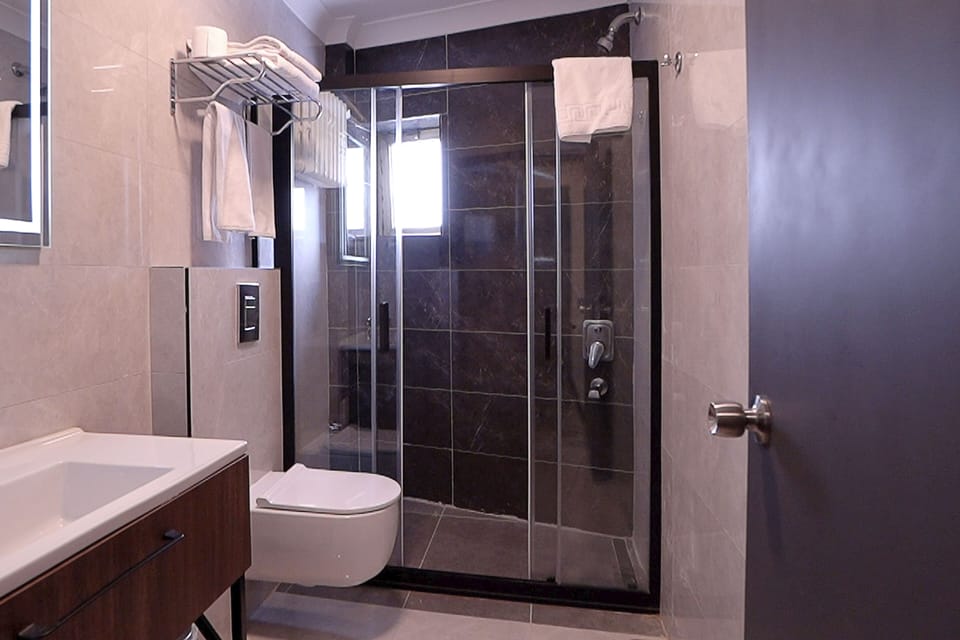 Hair dryer, slippers, heated floors (bathroom), towels