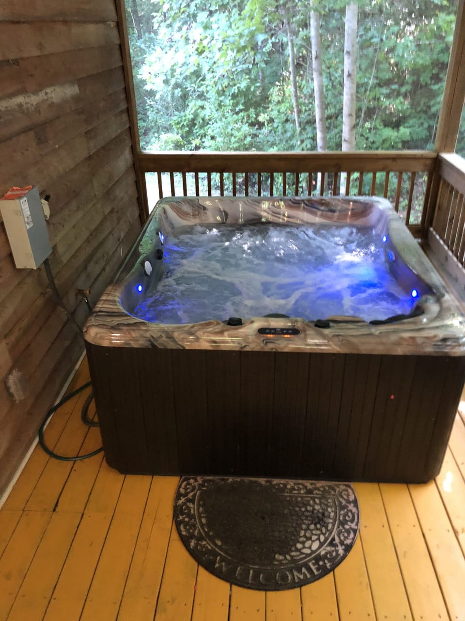 Super-nice hot tub with lighting and Bluetooth speakers.