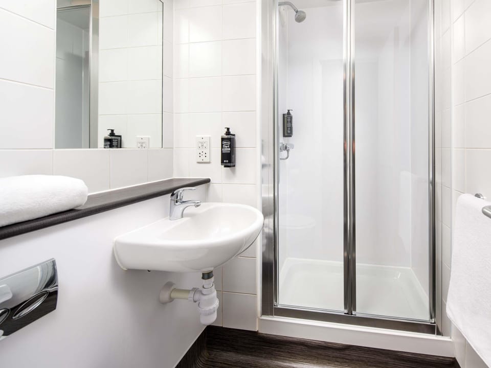 Desk, laptop workspace, blackout drapes, soundproofing