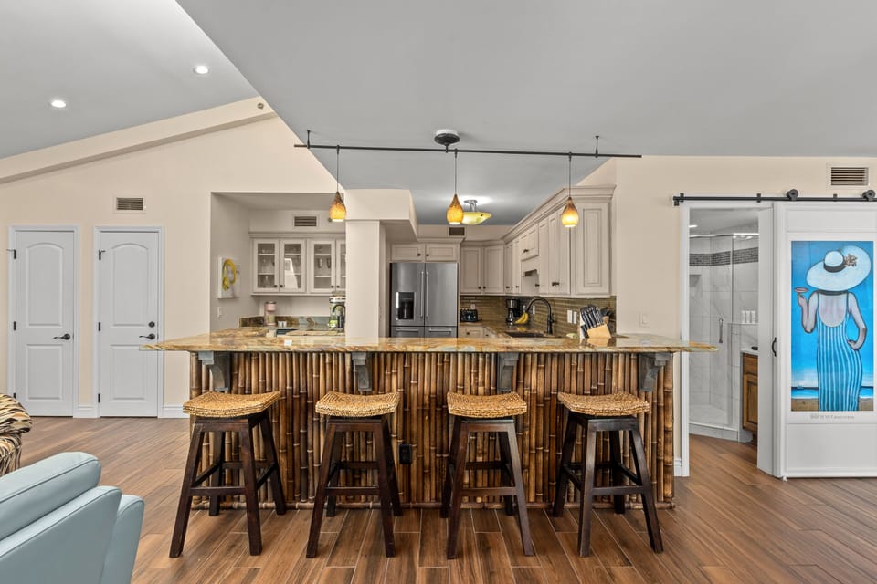 Lux Kitchen with Kitchen Aide appliances and see coffee bar w/ Keurig& Nespresso