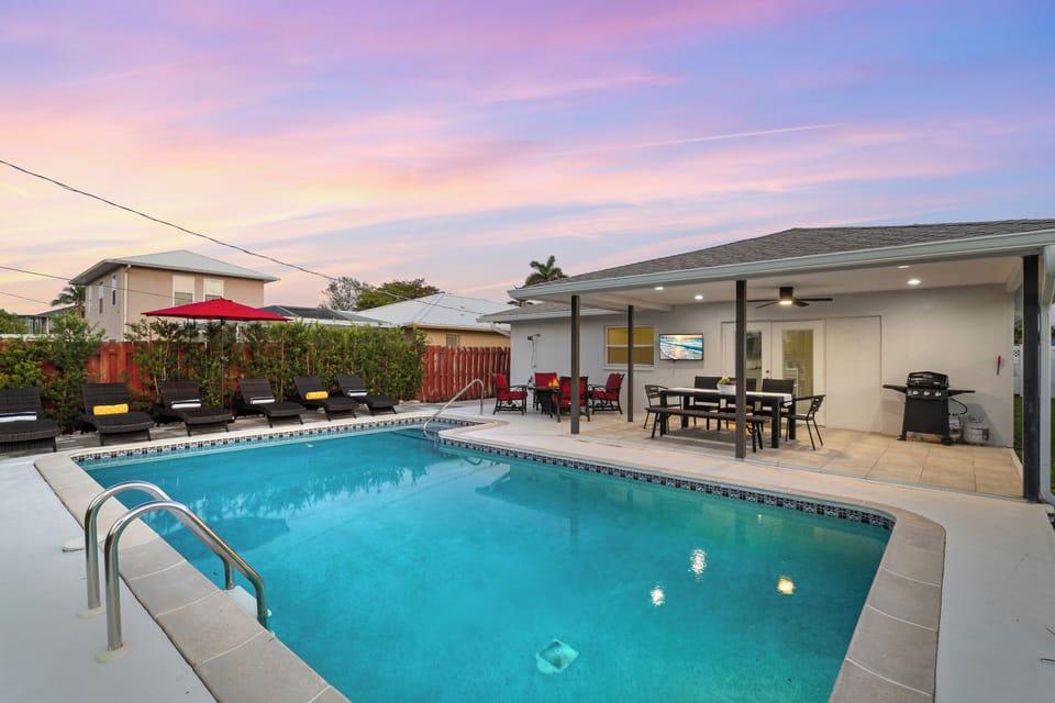 Watch the game or enjoy music while relaxing just steps from the pool