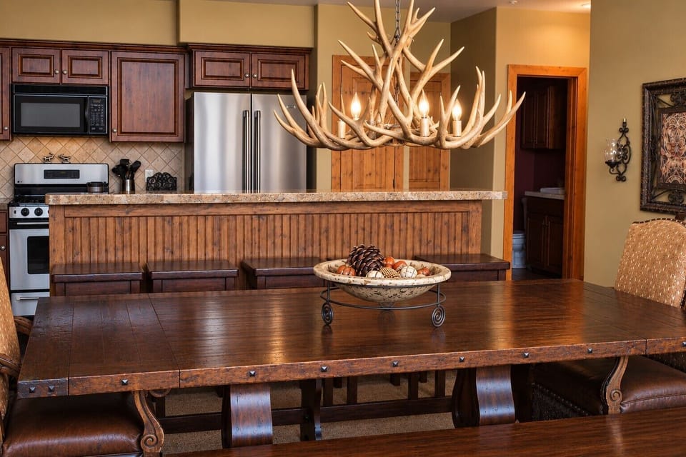 Large dining table for 8 plus breakfast bar seating for meals together