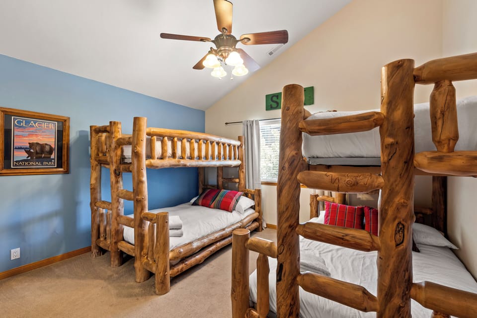 Bedroom 4 features 2 twin-over-full bunk beds.