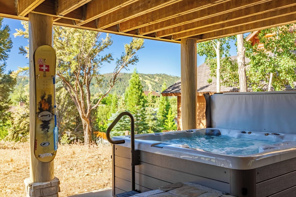 Hot tub with mountain views.