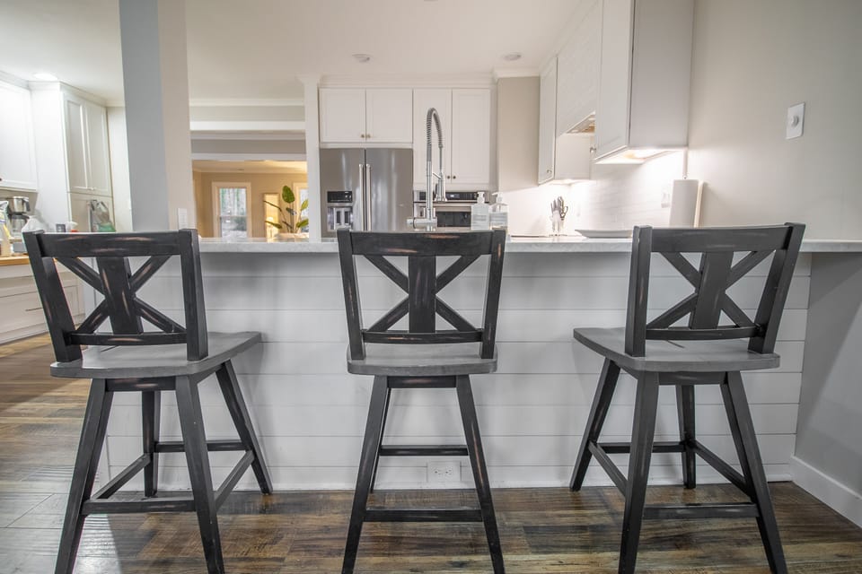 seating are in the kitchen. Taj Mahal solid piece leathered counters.