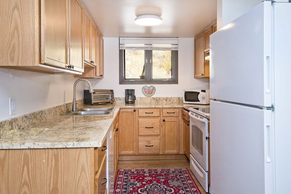 Townhome | Private kitchen | Highchair