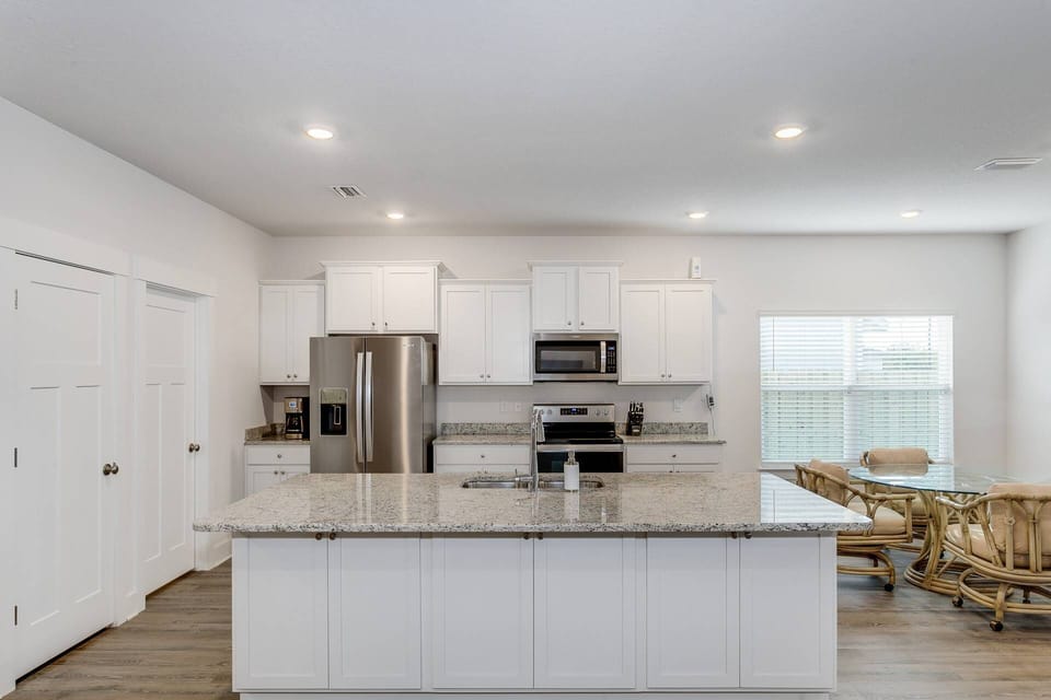 New appliances and large granite island, perfect for cooking with the whole family!
