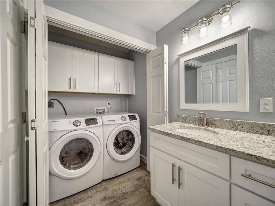 Washer and Dryer in Shared Bathroom
(Laundry Detergent Not Provided)