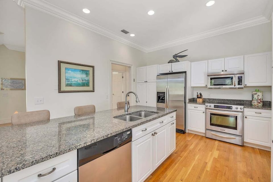 Side view of kitchen with stainless steel appliances
