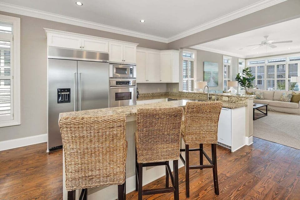Modern kitchen with stainless steel appliances and island seating
