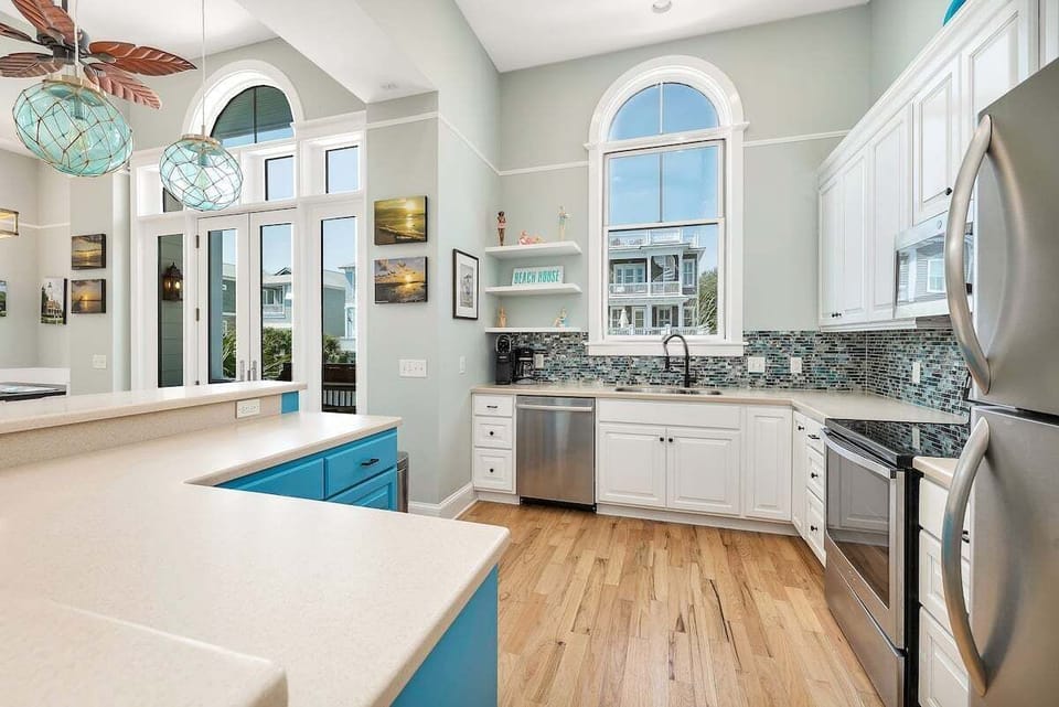 Alternate view of kitchen with stainless steel appliances