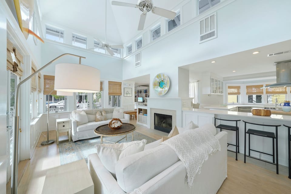LIVING AREA W/ FRENCH DOORS TO WRAPAROUND PORCH