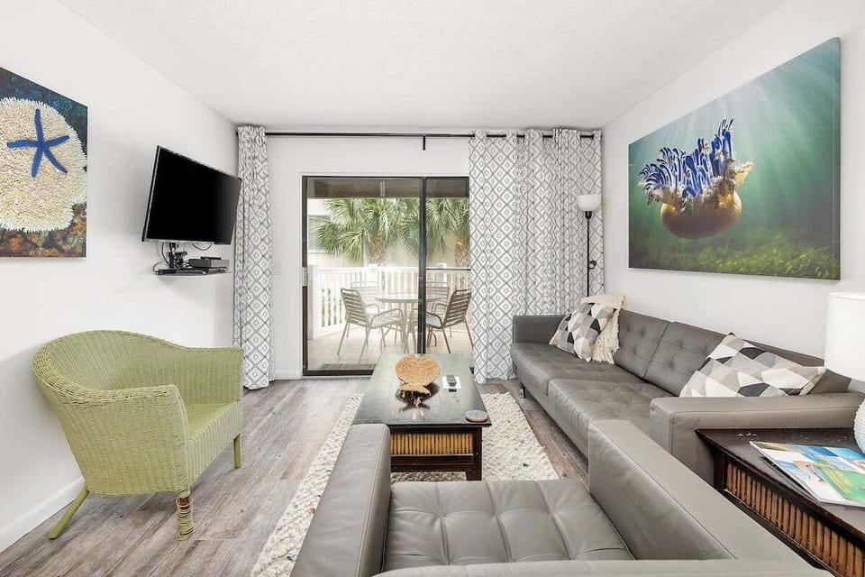 Shipwatch 103 - Living room area with access to balcony