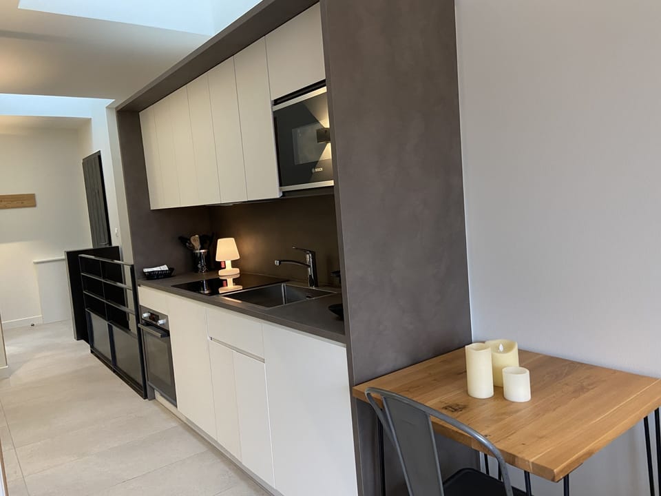 Panoramic Apartment | Living area | Flat-screen TV