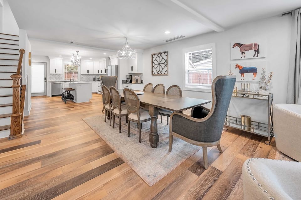 Inviting dining area designed for shared meals and great conversations. Features a spacious table, comfortable seating, and warm lighting, perfect for family dinners or casual gatherings with friends.