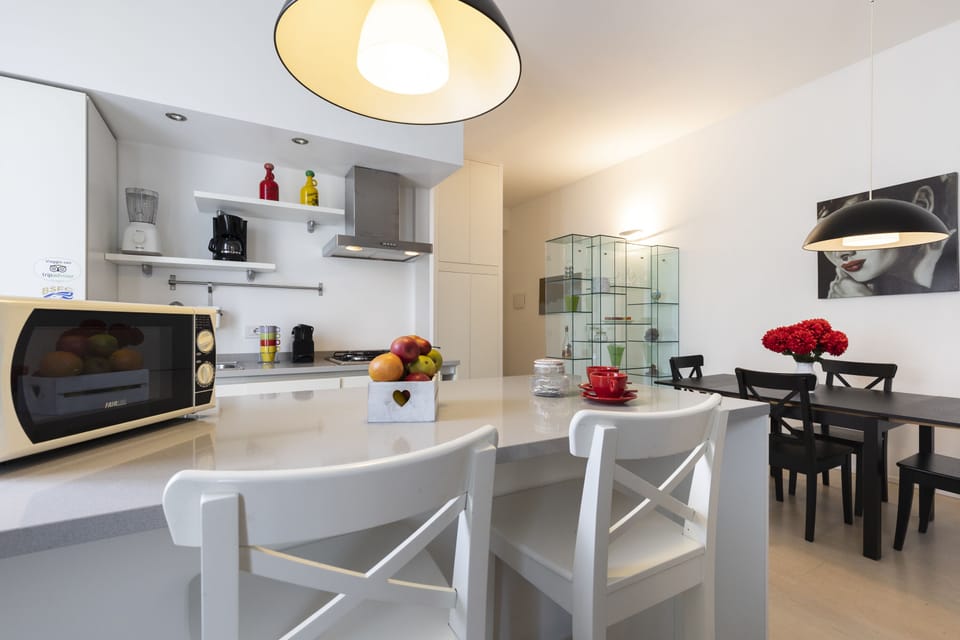 Deluxe Apartment, 1 Bedroom | Living area | 43-inch TV with digital channels